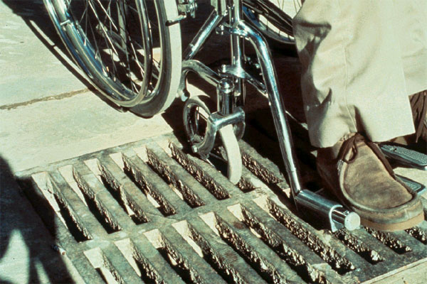 wheelchair on grate access route