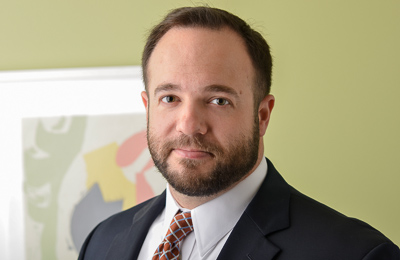 Headshot of Greg Care Headshot of Greg Care